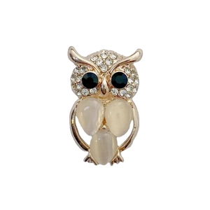 Exquisite gold owl brooch with white rhinestones and milky opalescent stones