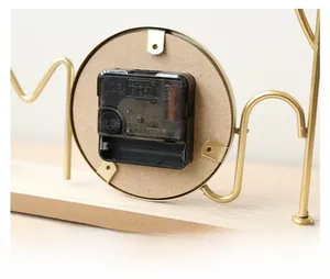 Detail of Sangtai 5168S silent quartz movement on round wood and gold iron frame