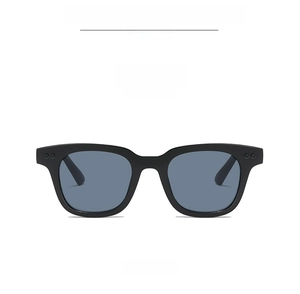 Front view of matte black square sunglasses with grey lenses and silver rivets