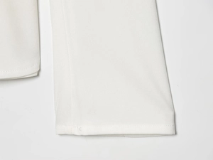 Detailed close-up showing the premium white twill fabric texture and fine stitching craft