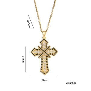 Gold plated cross necklace with zircon stones and dimensions 34x24mm on white background