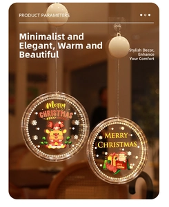 Détail de lampes LED de Noël à ventouse avec Père Noël et renne sur une surface vitrée