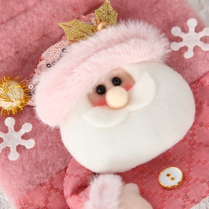 Pink Christmas gift bag with plush Santa Claus and sequin hat festive decoration