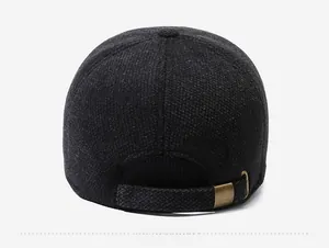Detail view of the winter wool baseball cap featuring an adjustable metal buckle strap