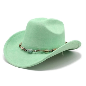 Detail of mint green suede cowboy hat with ethnic shell and turquoise beaded band