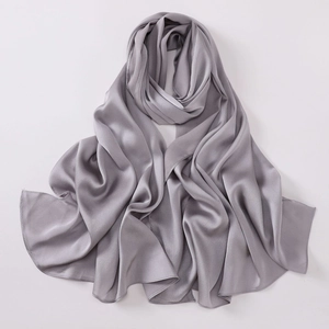 Detail view of silver grey faux silk chiffon shawl showing soft drape and glossy texture