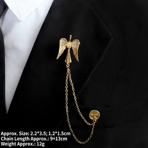 Detail of gold angel wings chain brooch with rhinestone accents and dimensions info