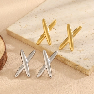Minimalist X-shaped stainless steel stud earrings in polished gold and silver finishes