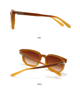 Detail of tortoiseshell square sunglasses with signature T-shaped metal hinges and gradient lenses