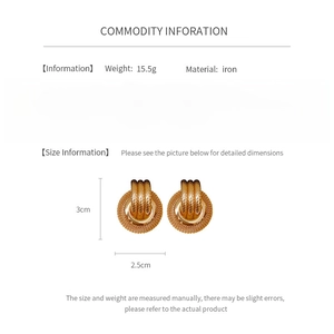 Detailed size chart showing gold iron hoop earrings weighing 15.5g and 3cm high