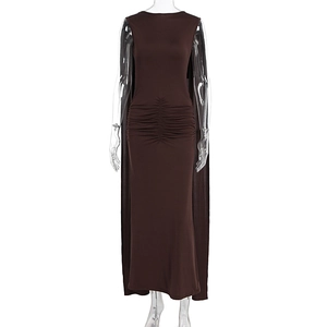 Detail of dark brown ruched maxi dress with long flowing shoulder capes and slim fit