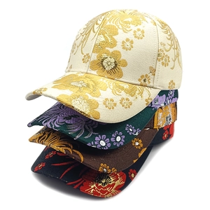 Floral embroidered baseball caps with traditional oriental brocade patterns in four colors