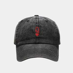 Washed denim baseball cap in dark grey with red embroidered Q-letter heart logo