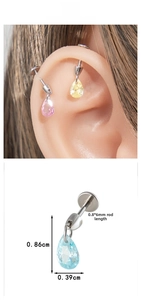 Detailed view of teardrop zircon cartilage studs in pink, yellow, and light blue colors