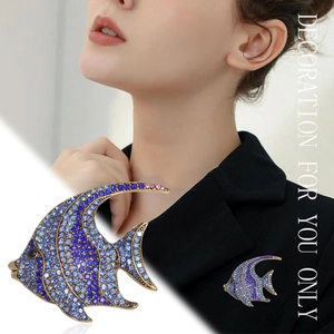 Exquisite fish brooch with blue and purple rhinestones on vintage gold metal base