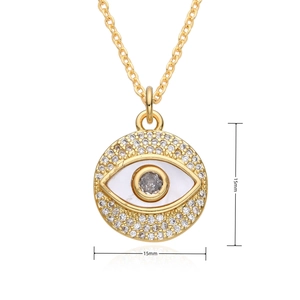 Detail view of gold Evil Eye pendant with clear crystals and 15mm size measurement