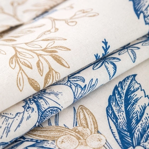 Detail of linen fabric with blue and brown leaf patterns for microwave oven cover
