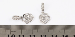 Silver rose pendants with crystals and scale ruler showing 20-25mm size details