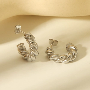 Silver stainless steel twisted rope C-shaped hoop earrings with a textured spiral design