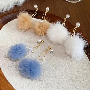 Gold-plated pearl earrings with colorful fur balls and sparkling zircon accents