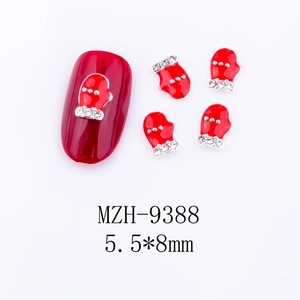 Makroansicht von 5,5x8mm roten Handschuh Weihnachts-Nagelkunst Charms mit Kristall Strass