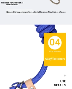 Detail of blue braided dog leash with adjustable alloy fasteners and leather connectors