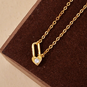 Elegant 925 sterling silver heart lock necklace with sparkling zircon on jewelry box