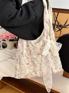 Floral lace shoulder bag with purple butterfly print and large lace bow for daily commute