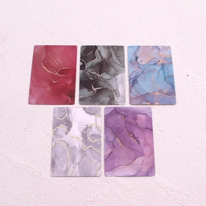 Elegant marble pattern jewelry display cards with gold foil edges for earrings packaging
