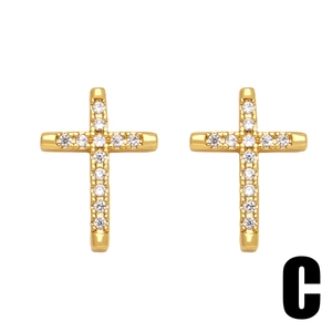 Classic gold cross earrings with sparkling zircon stones in a symmetrical pair set
