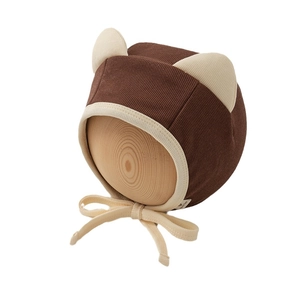 Brown ribbed baby bear hat with cream ears and chin straps for infants