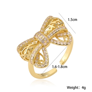 18K gold plated hollow bow open ring with sparkling champagne cubic zirconia stones