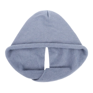 Close-up of light blue knit integrated scarf hood showing detailed texture and warm fabric
