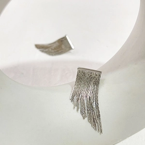 Silver fringe tassel metal earrings with vertical chain design in minimalist style