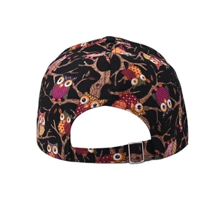 Detail of adjustable metal buckle on black baseball cap with colorful owl prints