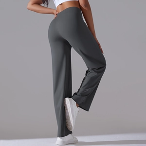 Macro shot of dark grey high-waisted wide-leg yoga pants showing fabric texture and drape