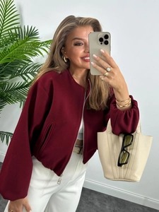 Fashionable burgundy bomber jacket with lantern sleeves and metal zipper closure for women