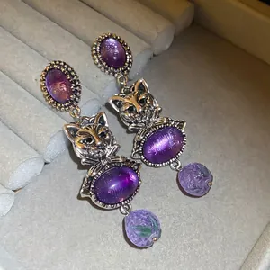 Vintage silver cat earrings with purple gemstones and floral drop charms for women