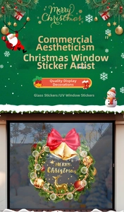 Detail of UV Christmas window sticker with golden bells and merry christmas wreath