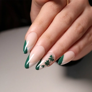 Long almond French press on nails with green clover design and glossy finish