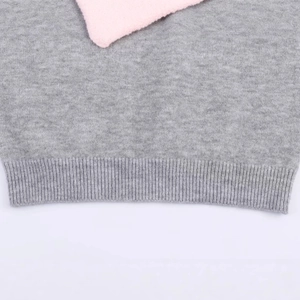 Gray knitted vest top with pink fur collar detail and ribbed hem for a stylish look