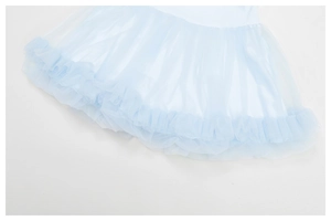 Detail view of light blue layered tulle mesh skirt with fine pleated ruffle edges