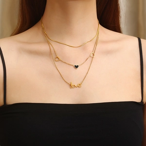 Elegant gold double-layer necklace set with black shell heart and love letter pendants