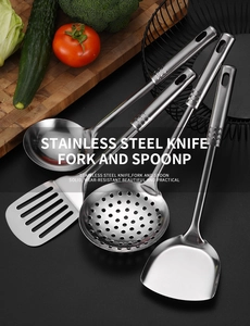 Detailed view of matte stainless steel spatulas and spoons with ergonomic wave handles