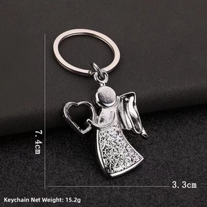 Silver angel holding heart keychain with dimensions 7.4x3.3cm and 15.2g net weight