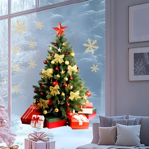 Detail view of artificial green Christmas tree with gold bows and gift boxes