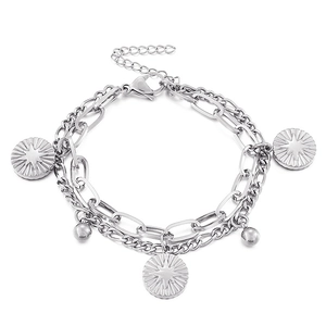 Silver double layer stainless steel bracelet with starburst sunburst coin charms