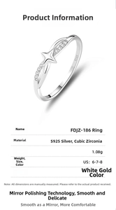 Macro view of S925 sterling silver four-point star ring with cubic zirconia inlay details