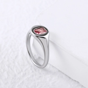Detailed view of square pink zircon stone set on a polished silver stainless steel ring