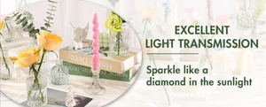 Clear glass candle holder with pink spiral candle for elegant dining table home decor